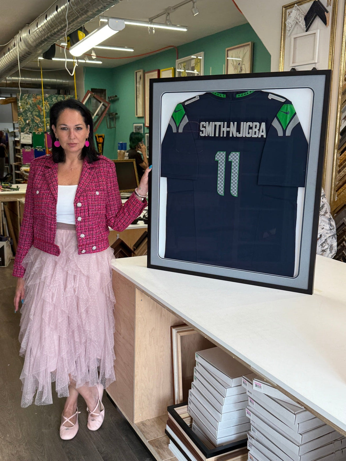 Tamar with an All Star Package framed jersey